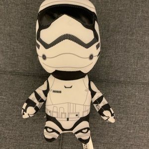 Star Wars Storm Trooper white plushie and Star Wars coffee tumbler.
